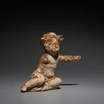 Oud-Grieks Terracotta Kind. 4e eeuw v.Chr. 6 cm hoog.