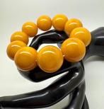 Armband met grote Baltische amber kralen, 46,6 gram. -, Antiek en Kunst
